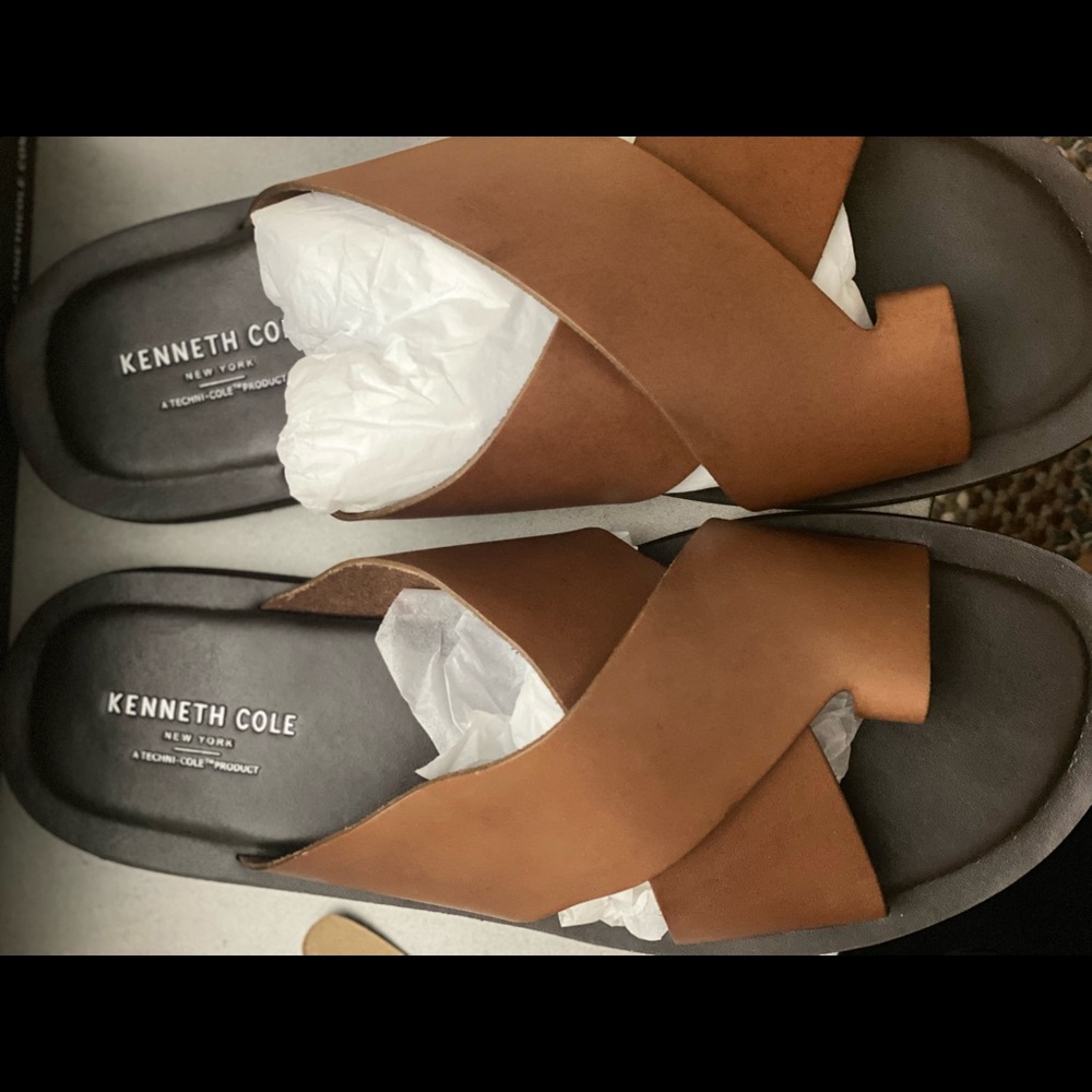 Men’s leather crosses strapped sandals for immediate sale.